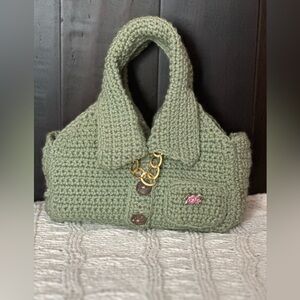 Green crochet Handbag shirt styled with Gold Chain and front pocket.
